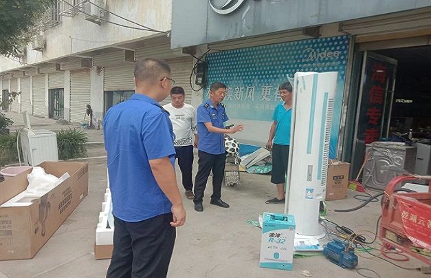 附件1：古饶城管中队对古饶街沿街商户提前宣教。.jpg